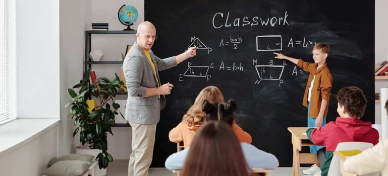 a teacher and students in classroom