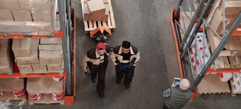 Man walking around a warehouse.