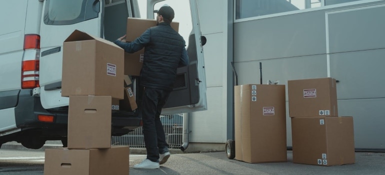 a man loading boxes