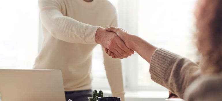 people shaking hands