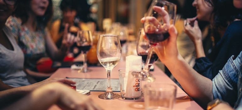 people drinking wine in a restaurant
