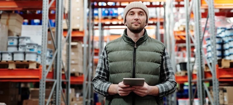a man in the warehouse doing freight inspection in Colorado