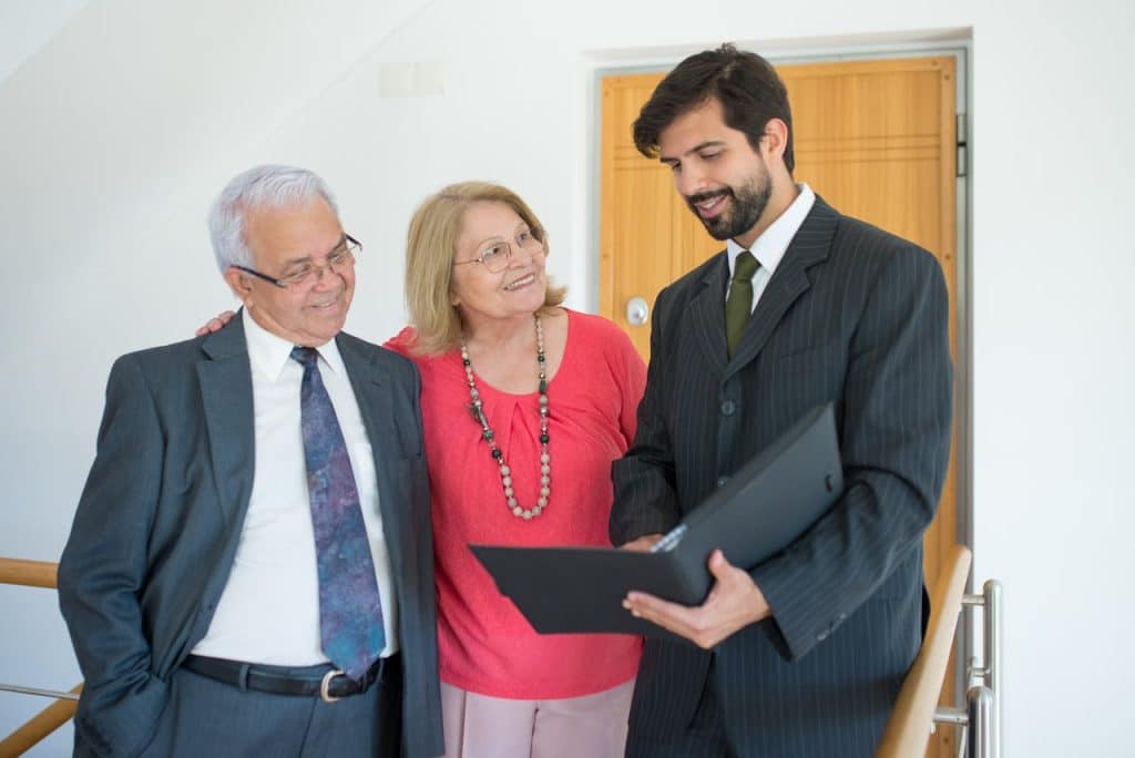 seniors with a real estate agent